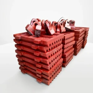 Factory Customized High Manganese Steel Casting Jaw Plate Fixed Movable Wear Spare Parts for Jaw Crusher Ore Mining Equipment